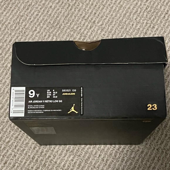 Nike Air Jordan 11 Retro Low GG in white and orange - Picture 7 of 8